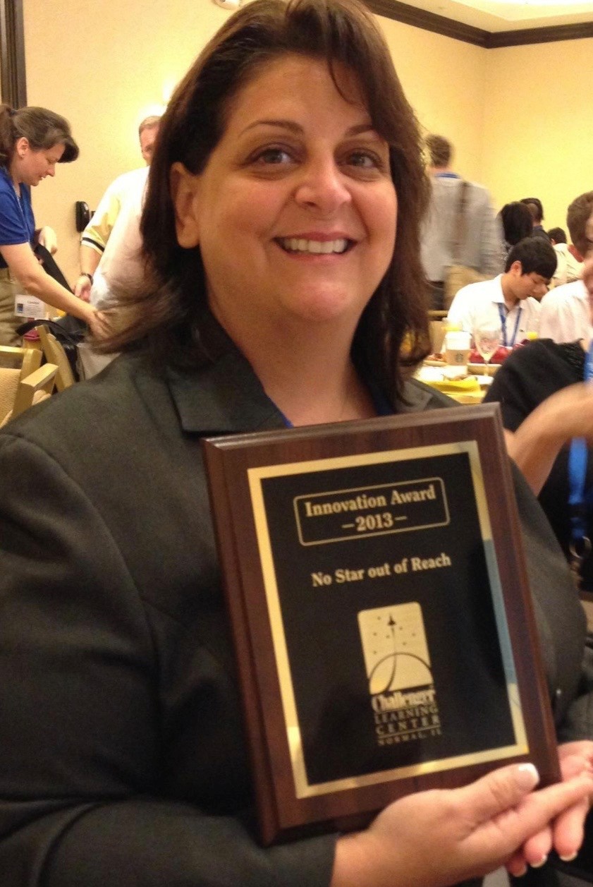 Laura Jean Checki receiving the Challenger Center Innovation Award (2013)